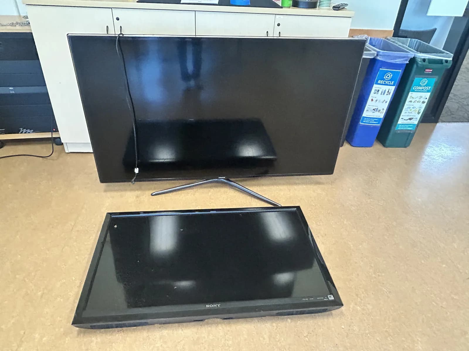 Two flat-screen displays placed beside each other at the collection